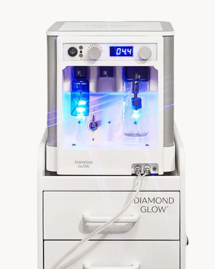 diamondglow-facial-device-cgt-aesthetics-evergreen-park-westmont DiamondGlow facial device used for exfoliation, extraction, and serum infusion treatments at CGT Aesthetics in Evergreen Park and Westmont, Illinois